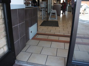 FloodBreak matched the interior floor tile to cover the passive flood barrier