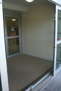 passive flood barrier with polished concrete wiper wall