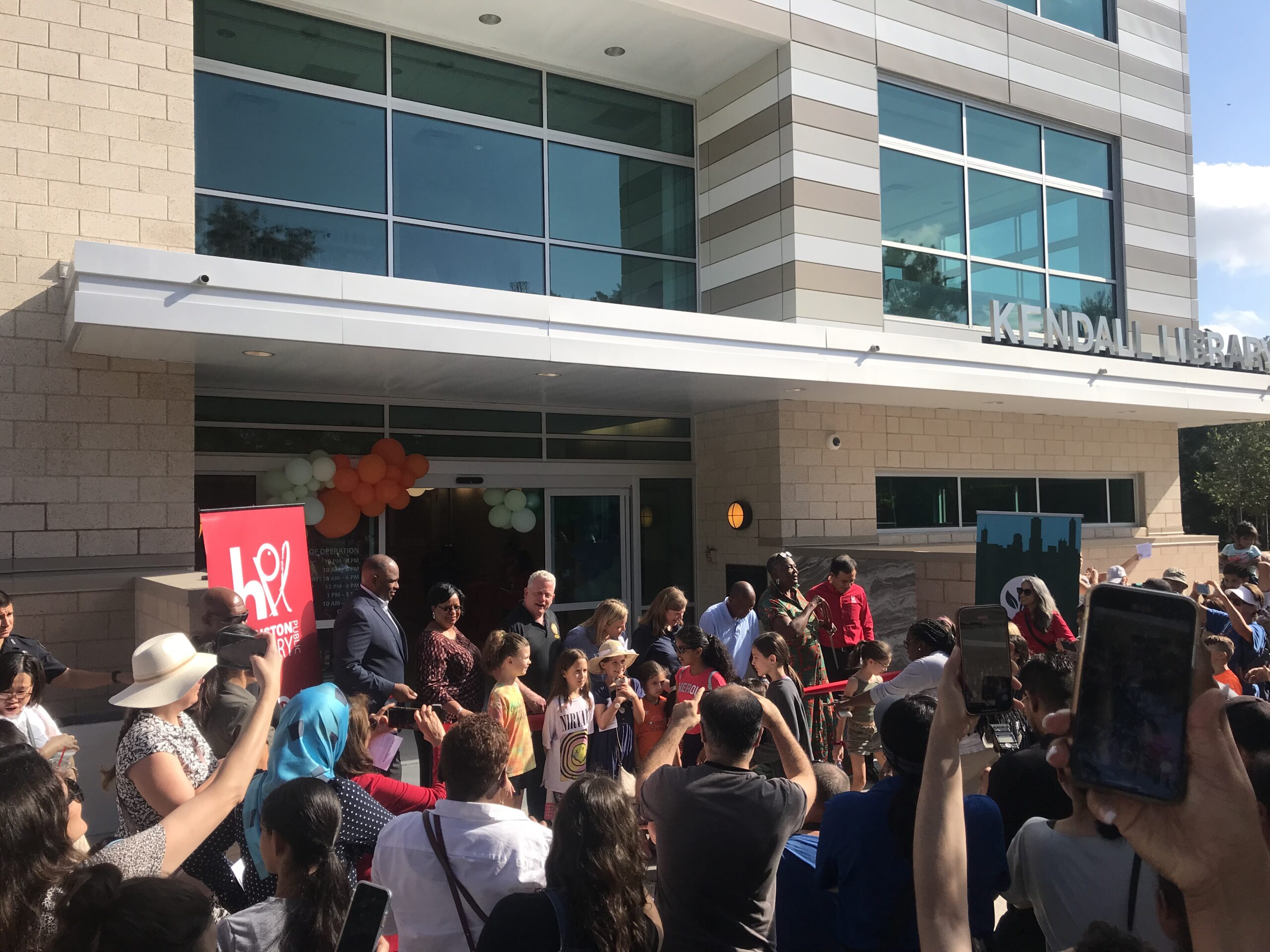 Kendall Library reopening - cutting ribbon