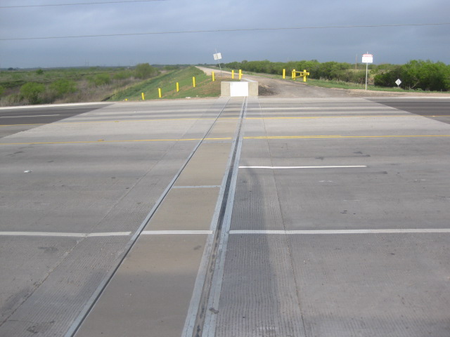 FloodBreak Roadway Gate extends levee across highway